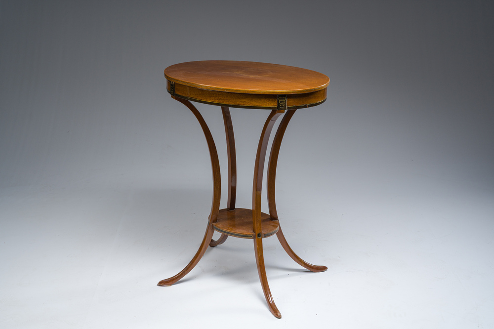 Jean-Joseph Chapuis (1765-1864): A brass inlaid wooden gueridon on four curved supports, first quarter 19th C.