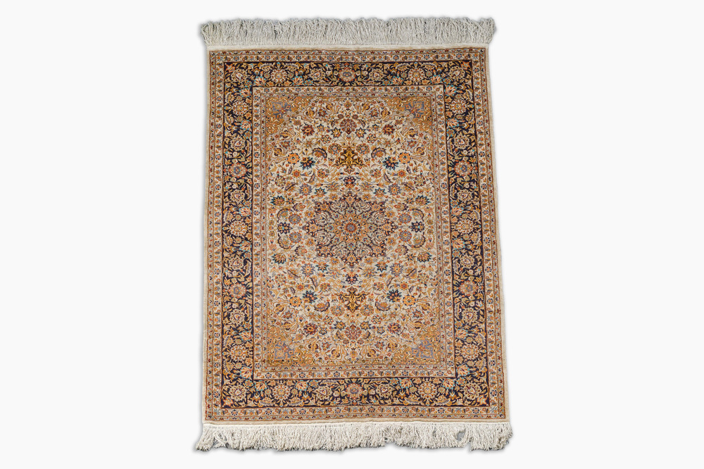 A Sino-Tabriz silk rug with floral design, 20th C.