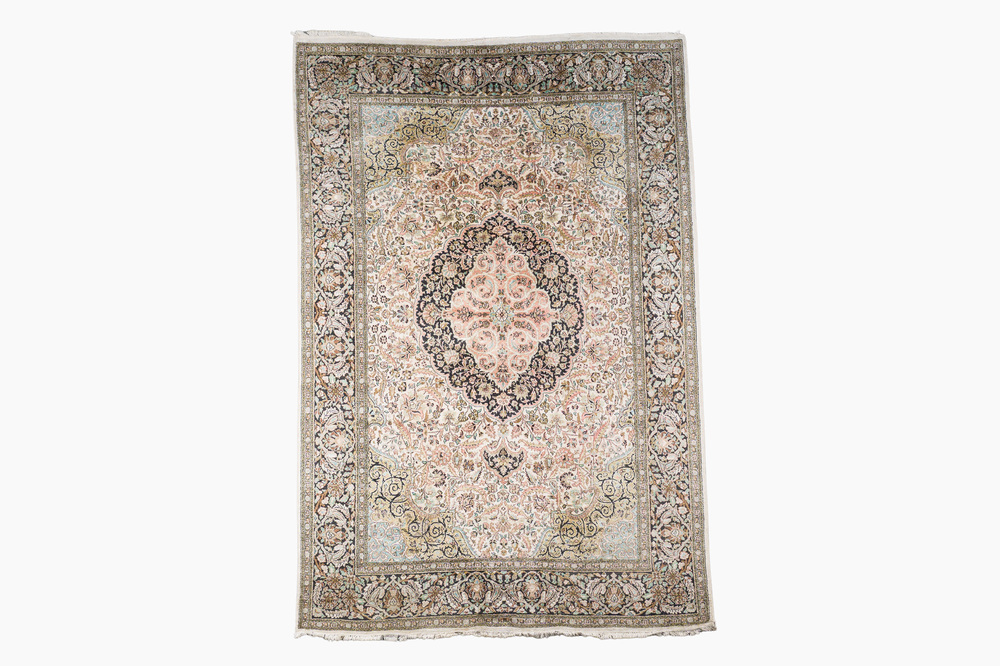An Indian silk Kashmir rug with floral design, 20th C.