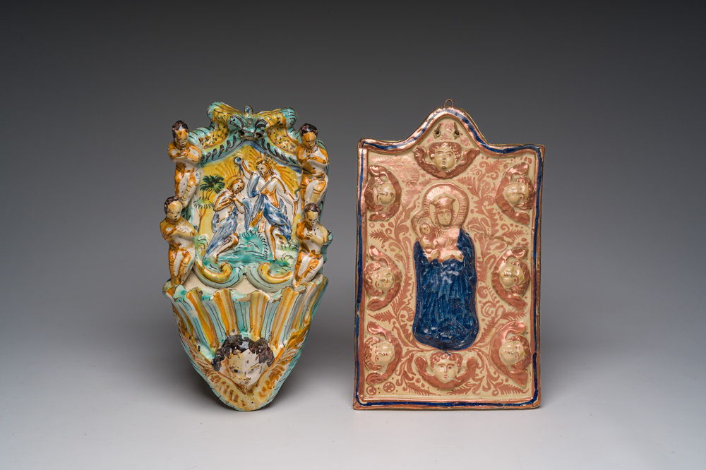 An Italian maiolica holy water font and a Spanish luster-glazed 'Madonna and Child' plaque, 17th/19th C.