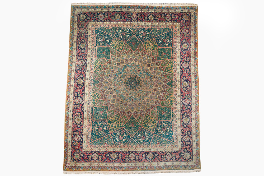 A Persian Tabriz rug with floral design, wool on cotton, first half 20th C.