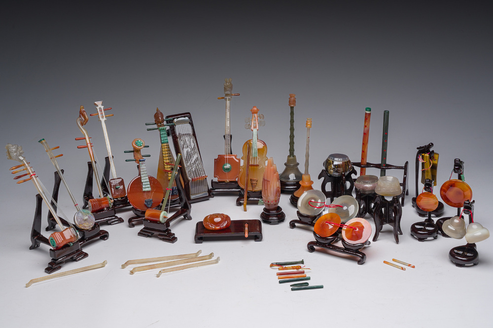 A Chinese collection of agate carved musical instruments with an accompanying presentation box, Republic, 20th C.