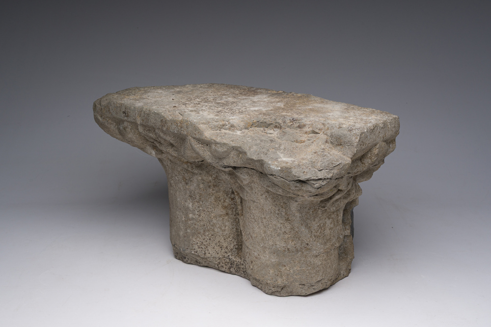 A large Romanesque Tournai stone capital with carved foliage, Flanders, 12th/13th C.