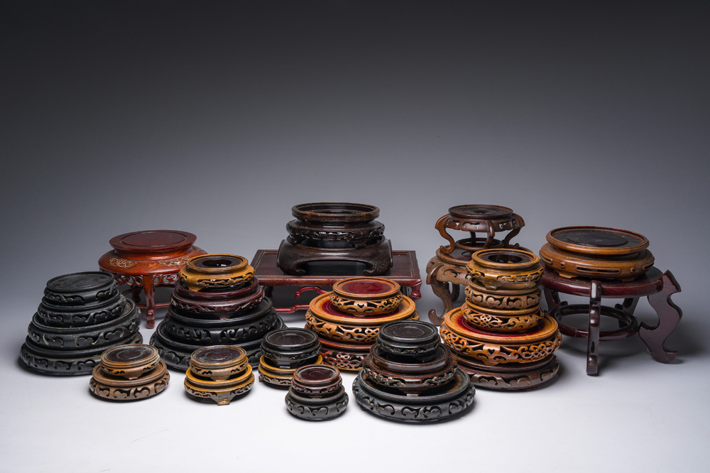 A collection of Chinese wooden stands, 20th C.