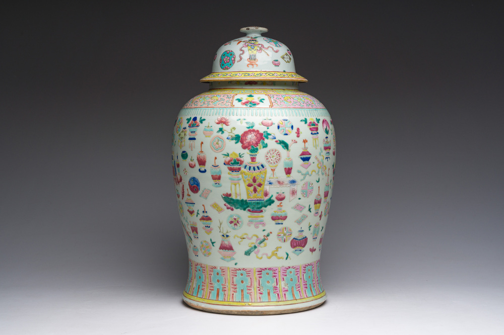 A Chinese famille rose 'antiquities' vase and cover, 19th C.