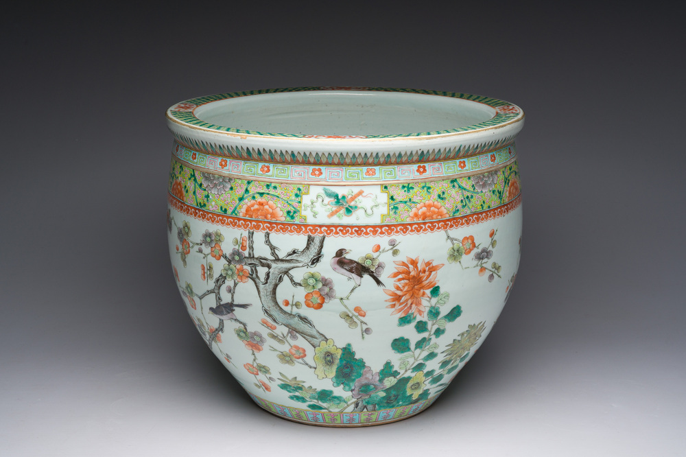 A Chinese famille verte fish bowl with birds among blossoming branches, 19th C.