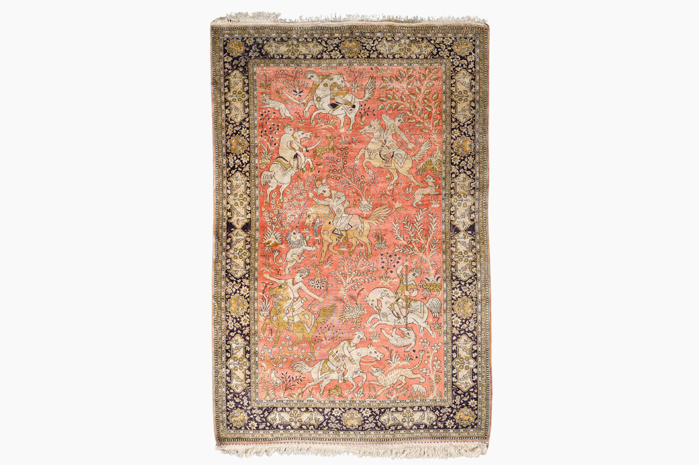 A Persian Qom (Qum/Ghom) silk rug with hunting scenes, 20th C.
