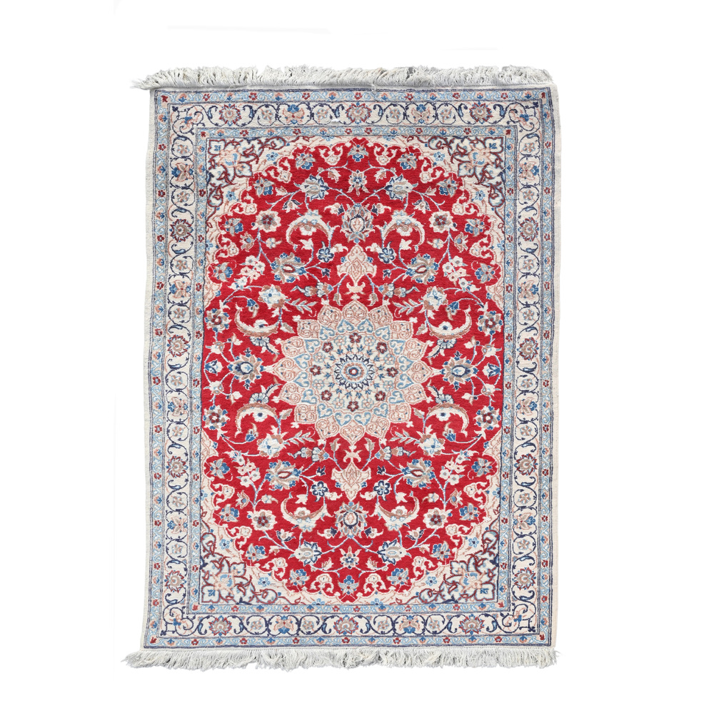 A Persian Nain rug with floral design, wool and silk on cotton, 20th C.