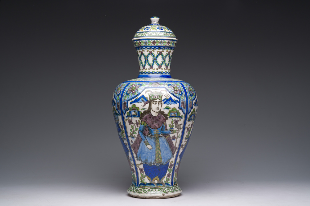 A large Persian pottery vase and cover with figurative design, 20th C.
