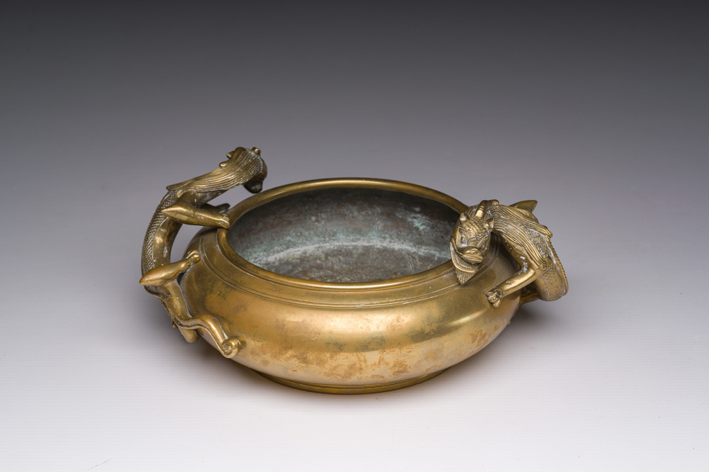 A Chinese bronze censer with relief design, Xuande mark, 19th/20th C.