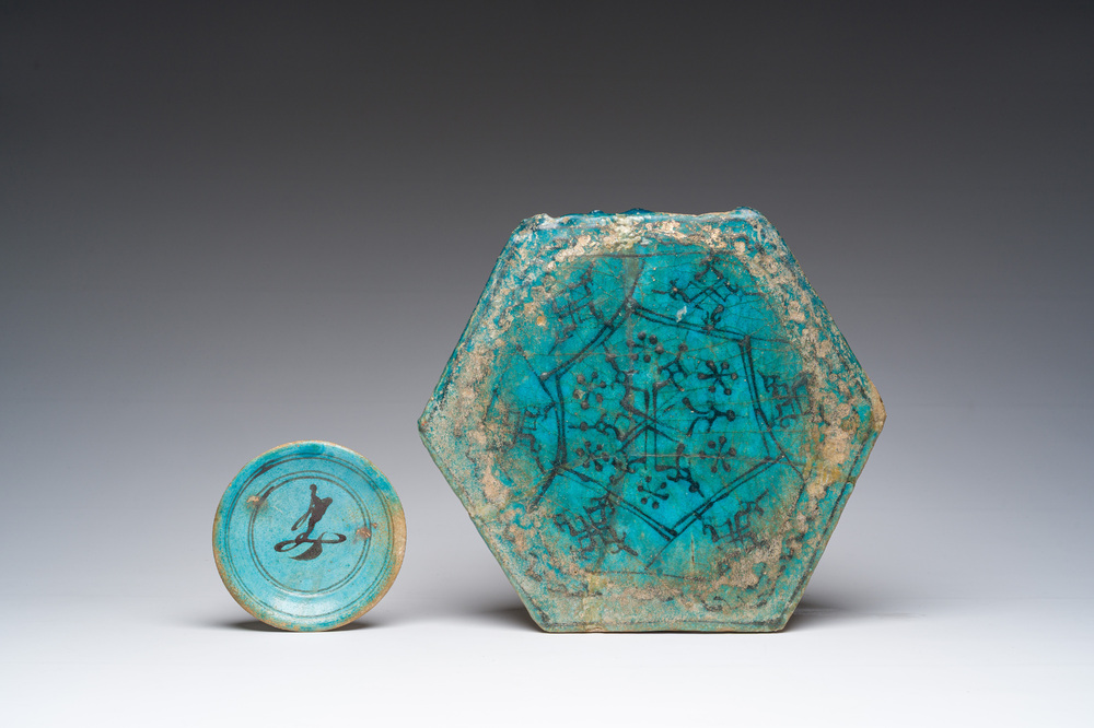 A hexagonal turquoise glazed Islamic tile and a calligraphic saucer, probably Damascus, Syria, 17th C.