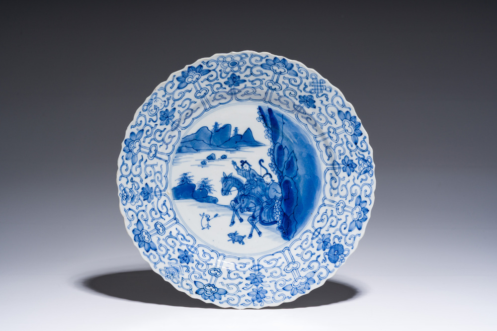 A Chinese blue and white 'Mongolian hunting' dish, Chenghua mark, Kangxi