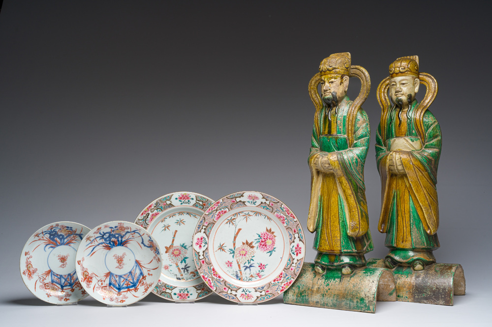 A pair of Chinese sancai roof tiles, a pair of famille rose plates and a pair of Imari style plates, Ming and later