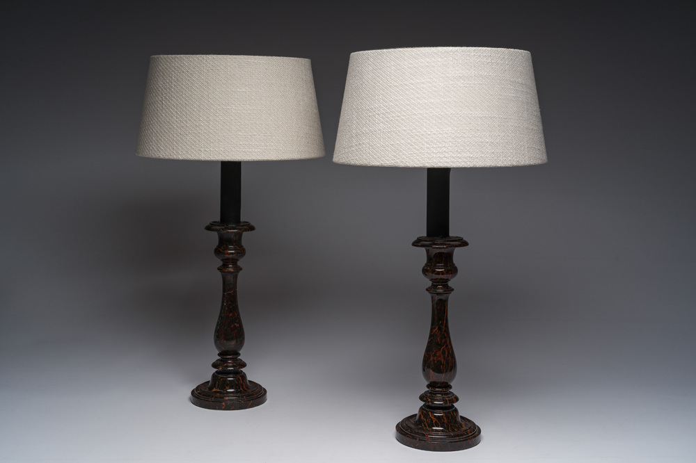 A pair of serpentine candlesticks mounted into table lamps, 19th C.