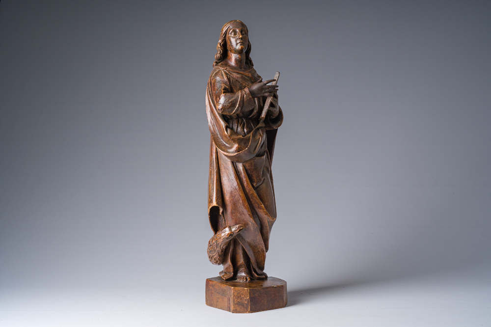 A Flemish patinated wooden 'John of Patmos' sculpture, ca. 1800