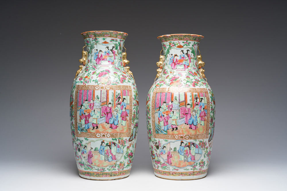 A pair of Chinese Canton famille rose vases with palace scenes and floral design, 19th C.