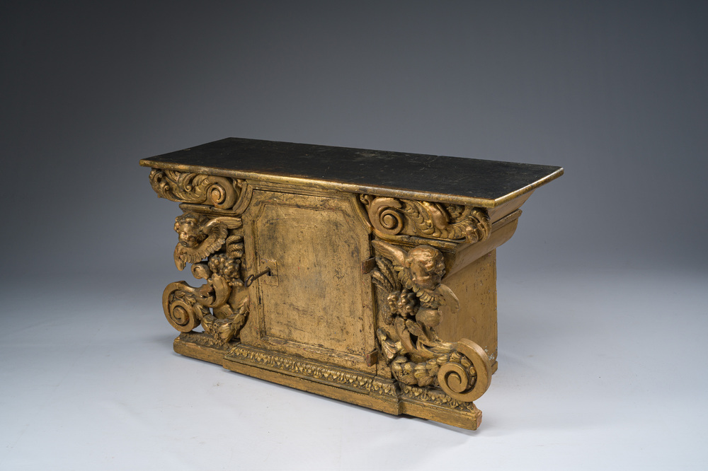 A gilt wooden tabernacle with floral design and angels, 18th C.