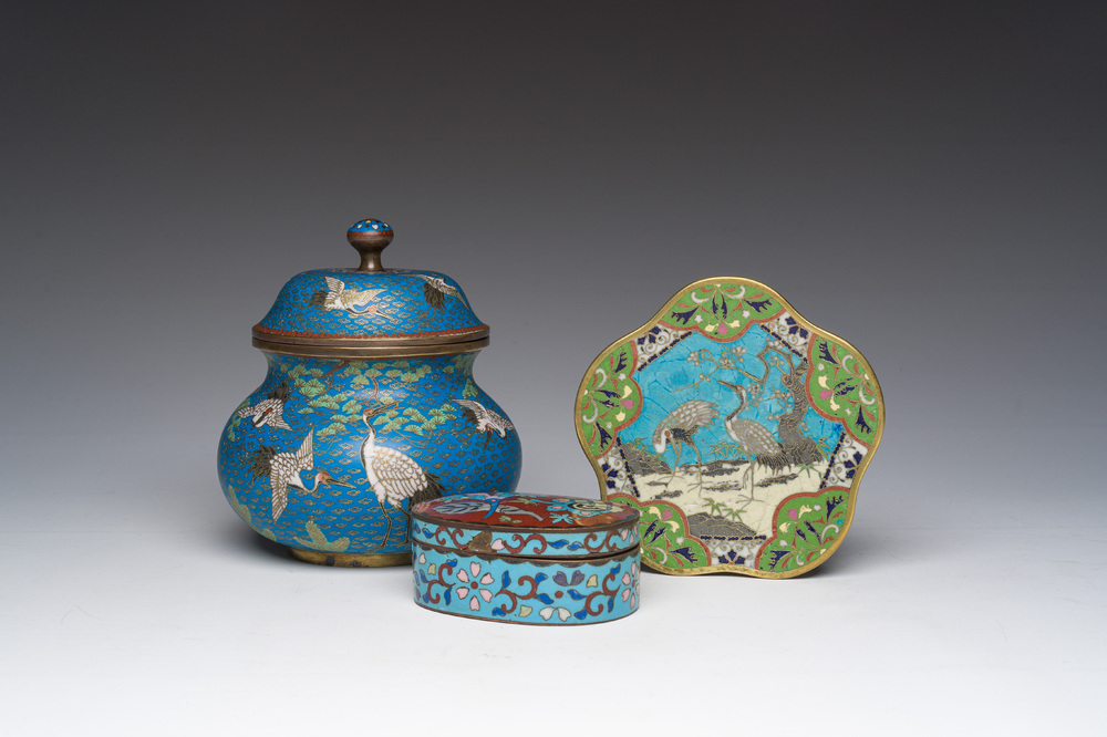 A Japanese cloisonn&eacute; jar and cover, a box and cover and a tray with cranes and floral design, Meiji, 19th/20th C.