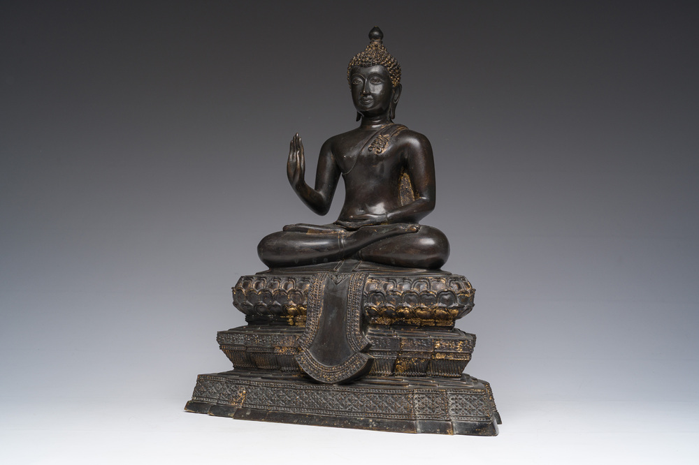 A Thai bronze sculpture of the seated Buddha with traces of gilding, Rattanakosin, 18th/19th C.
