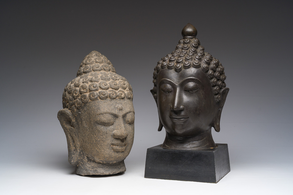A Thai bronze Buddha head and a Chinese stone Buddha head, 19th/20th C.