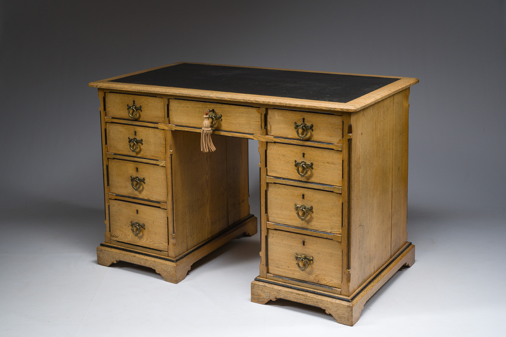 An English nine-drawers wooden pedestal desk with ebonized wooden inlay and leather top, Garnett &amp; Sons, ca. 1900