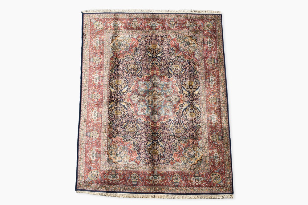 A presumably Indian Qom (Qum/Ghom) rug with floral design, wool on cotton, 20th C.