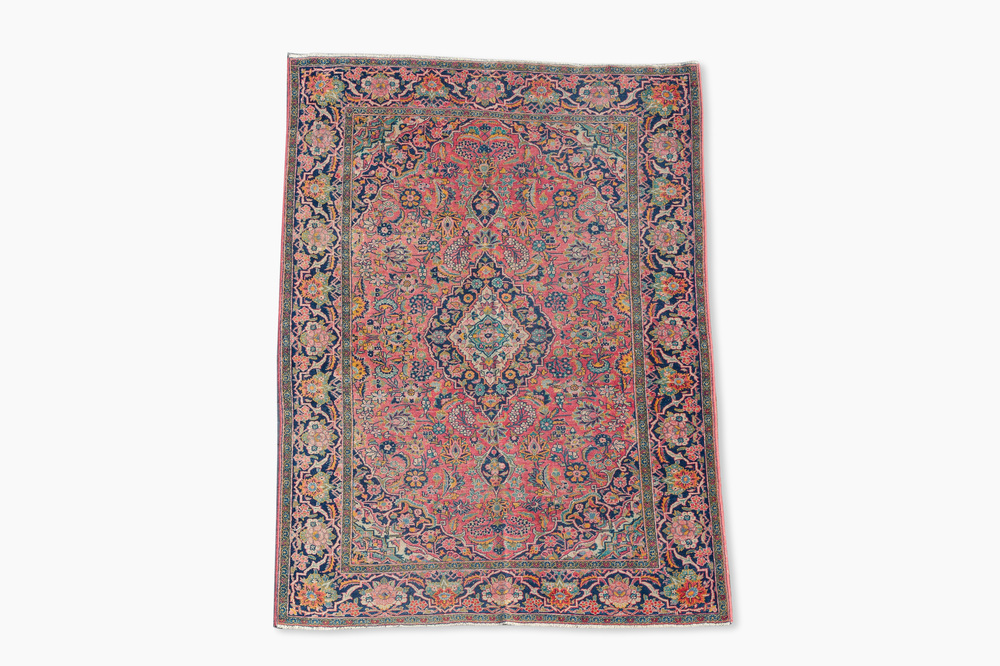 A Persian Keshan (Kashan) rug with floral design, wool on cotton, first half 20th C.