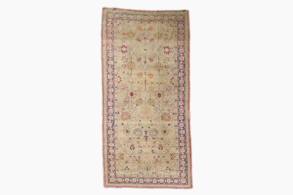 A Persian Tabriz 'Jahi Jalili' rug with floral design, wool on cotton, early 20th C.