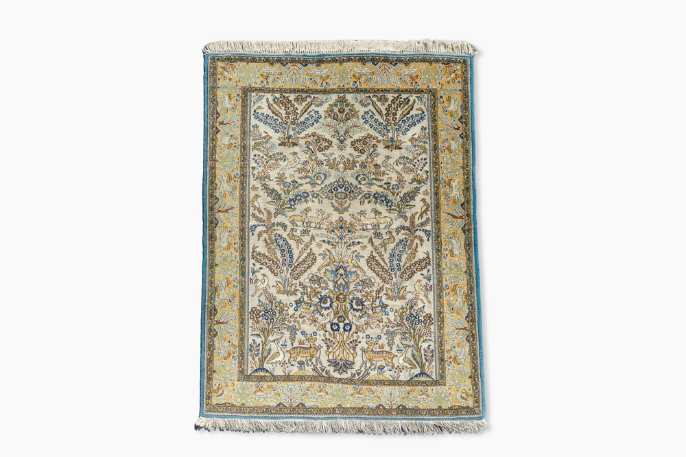 A Persian Qom (Qum/Ghom) rug with floral design, silk on cotton, 20th C.