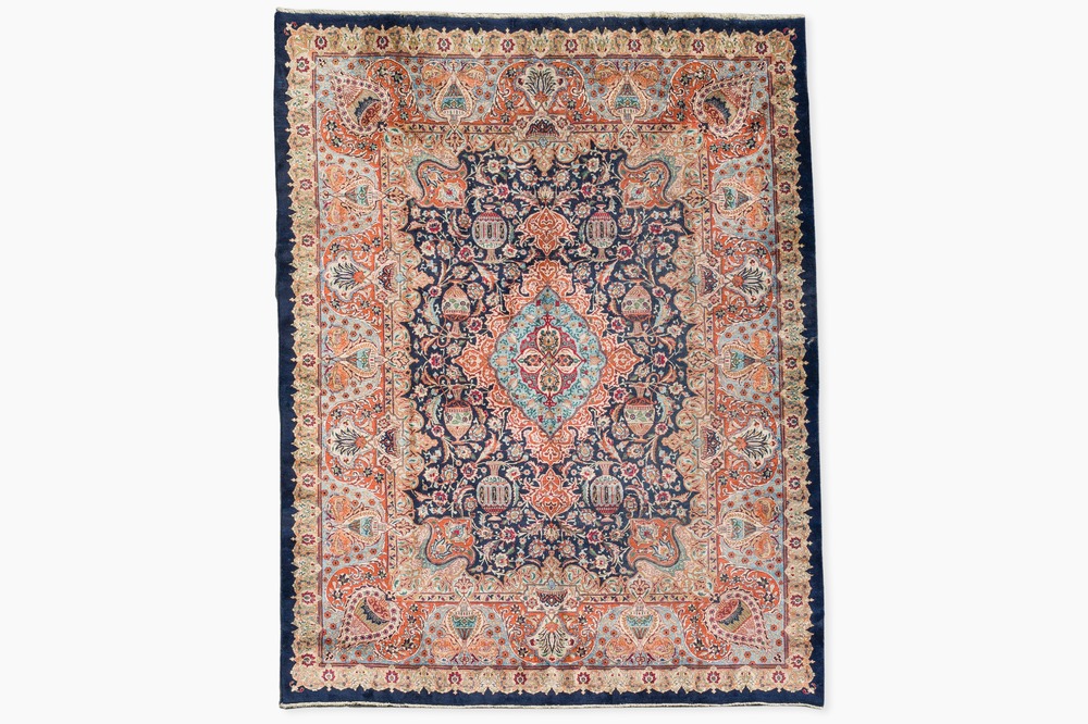 A Persian Kashmar rug with floral design, wool on cotton, 20th C.