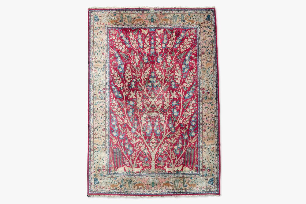 A Persian Tabriz 'tree of life' rug, wool on cotton, mid 20th C.