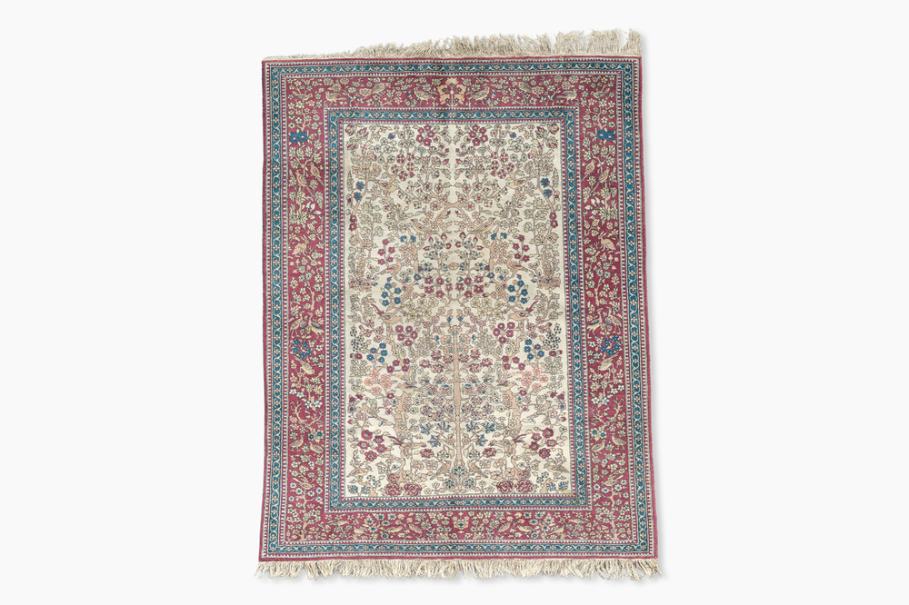 A Turkish 'tree of life' rug, wool on cotton, 20th C.