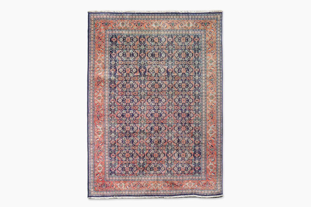 A Persian Tabriz rug with floral design, wool on cotton, 20th C.
