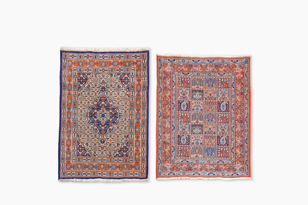 Two Persian Bakhtiar rugs with floral design, wool on cotton, 20th C.