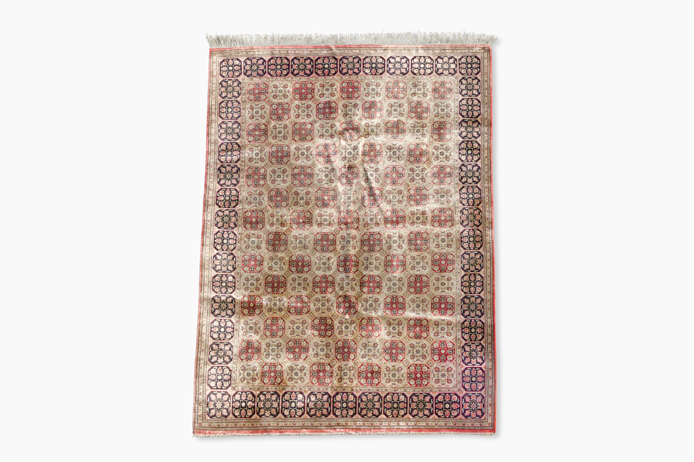 A Persian Qom (Qum/Ghom) silk rug with floral design, 20th C.