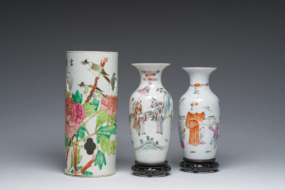A Chinese reticulated qianjiang cai hatstand with birds among blossoming branches and two famille rose vases with animated design, 19th/20th C.