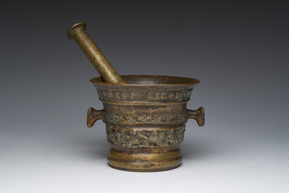 A Flemish bronze mortar with relief design and animal head-shaped handles with pestle, Petrus Van den Ghein, dated 1584, 19th C.