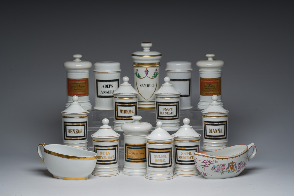 Thirteen Belgian and French gilt and polychrome decorated porcelain pharmacy jars and two bourdalous, 19th C.