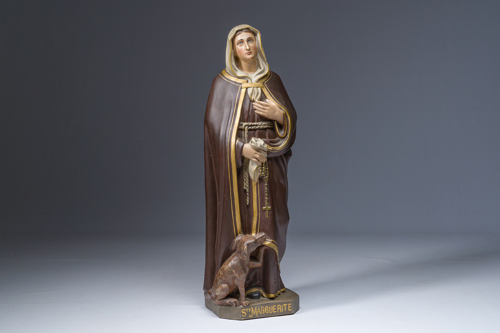 A polychrome decorated plaster figure of Saint Margaret with her dog, 19th/20th C.