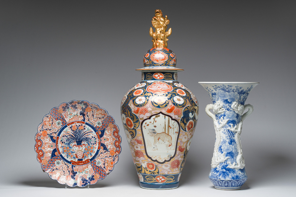 A Japanese blue and white Hirado vase with dragon relief design, an Imari vase and cover and a dish with floral design, Meiji, 19th/20th C.