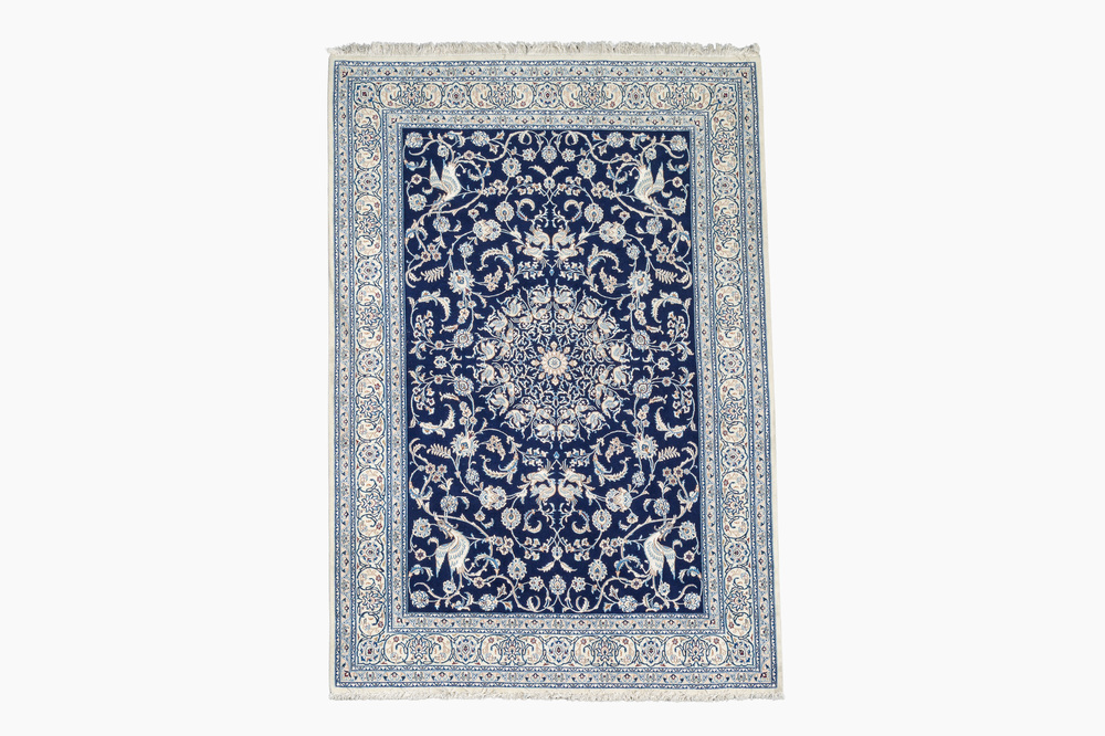 A Persian Isfahan rug with Nain design, wool and silk on silk, 20th C.
