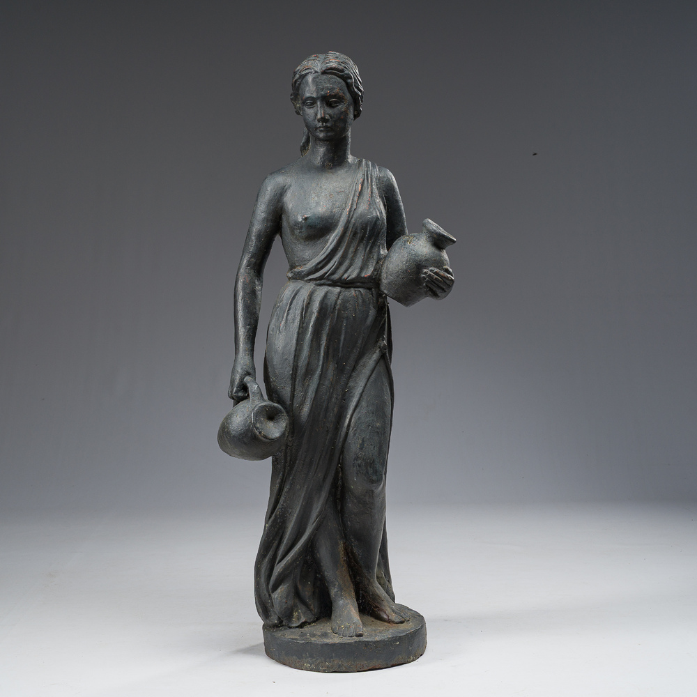 A patinated lead garden statue of a lady with water jugs in her hand, 19th/20th C.