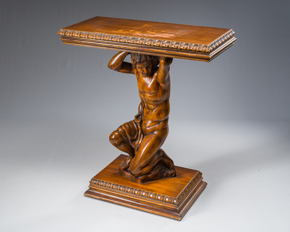 An Italian wooden console table in the shape of a kneeling man carrying a panel, second half 20th C.