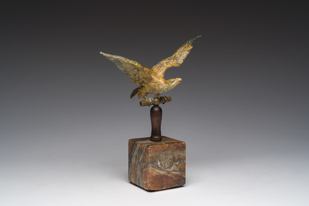 A Viennese polychrome cold painted bronze model of an eagle on a wooden and onyx marble base, 19th/20th C.