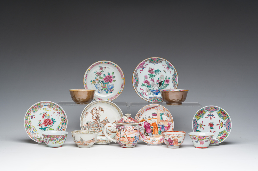 Six Chinese famille rose and gilt cups and saucers and a cream jug with floral and mandarin design, Yongzheng/Qianlong