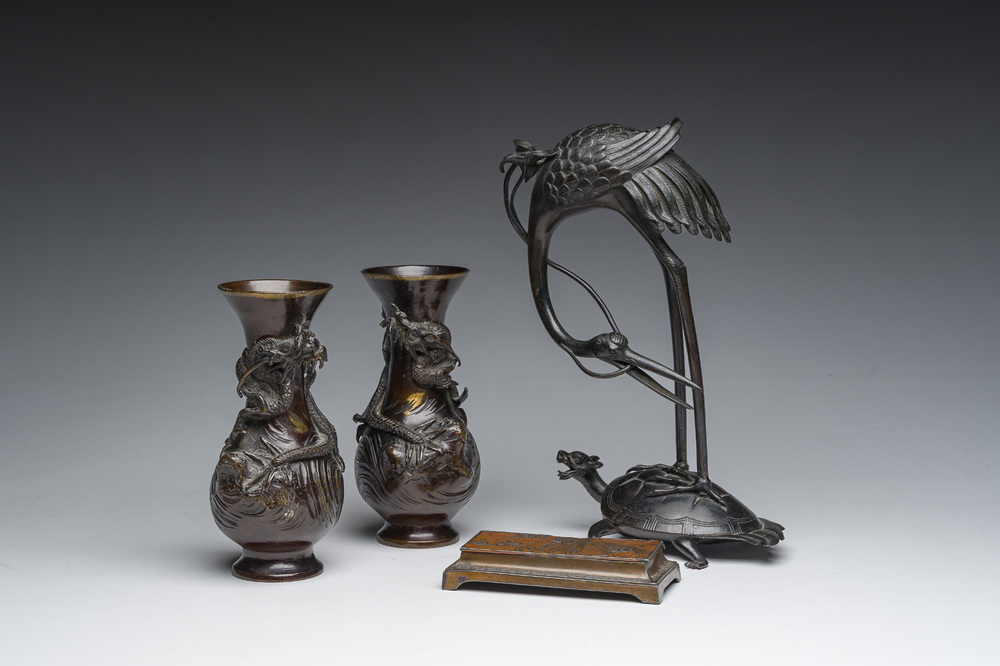 A pair of Japanese bronze vases with dragon relief design, a 'crane and turtle' joss stick holder and a stamp box, Meiji and later, 19th/20th C.
