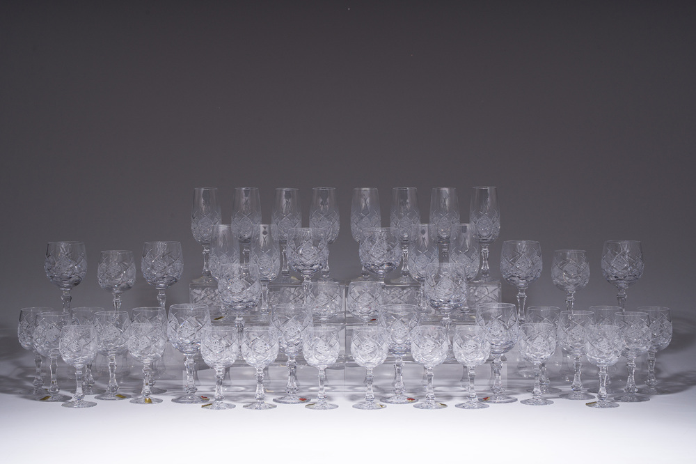 A French 48-piece collection of colourless crystal glasses with etched design, Bayel, 20th C.