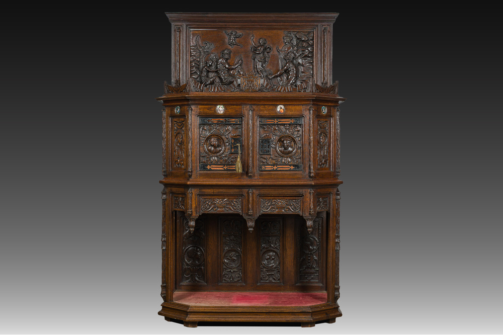 A French richly carved oak Neo-Renaissance credence with portrait miniatures, 19th C.