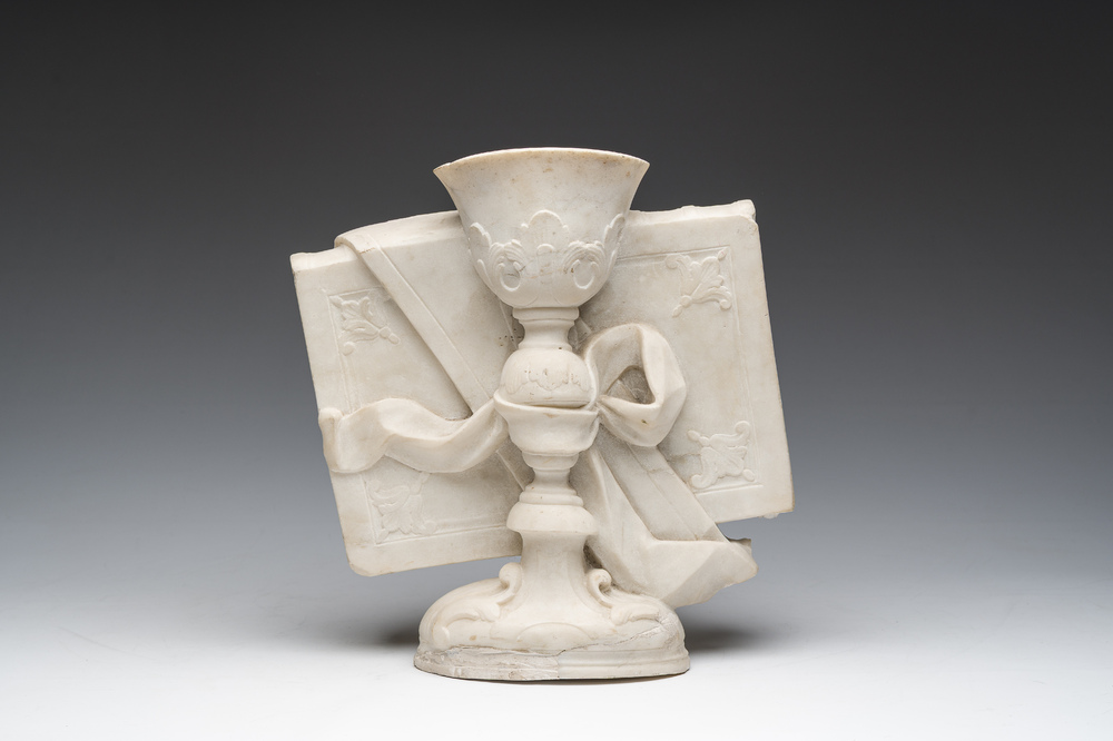 A French white marble sculpture of a chalice resting on a book, 18th/19th C.