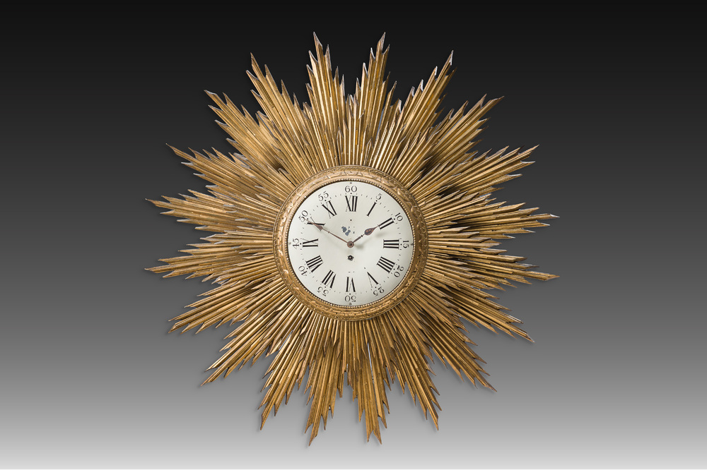 An imposing German carved and gilt wooden sundial with an 'Actien-Gesellschaft Uhrenfabrik Lenzkirch' (AGUL) mechanism, ca. 1900